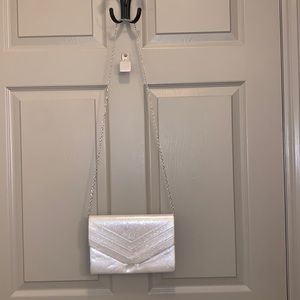 Silver clutch with removable strap